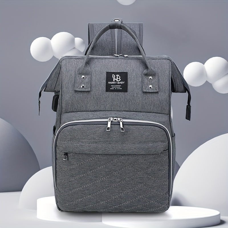 Large waterproof grey mommy backpack with bottle warmer, utility pockets, and soft shell for casual use.