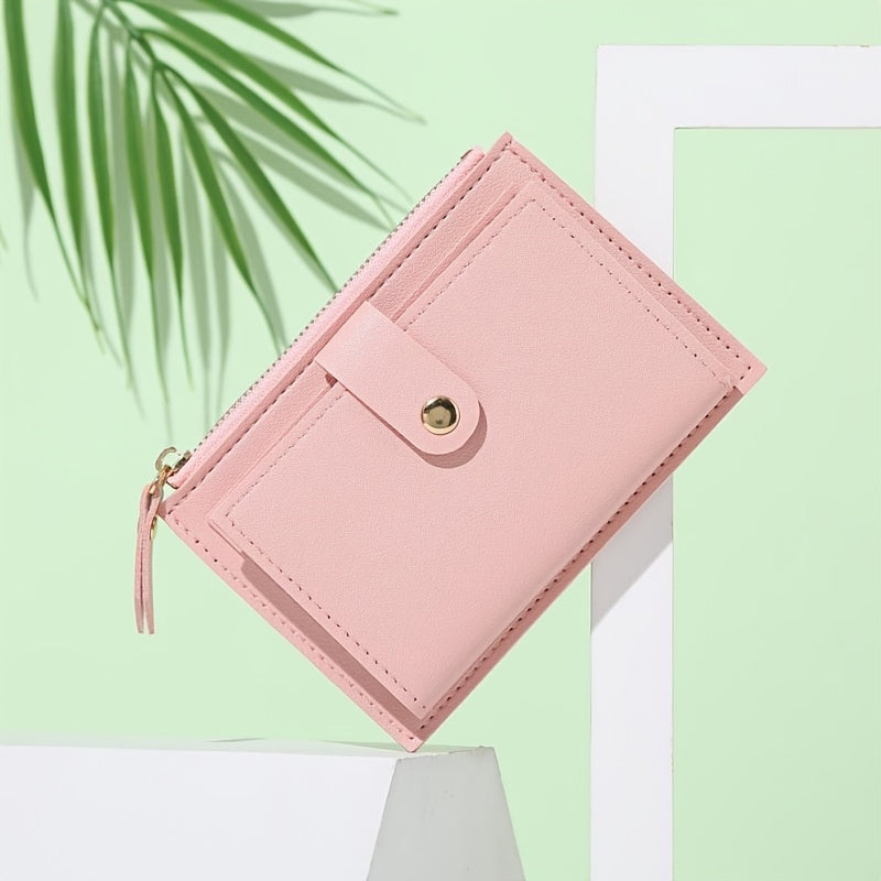 Slim short wallet for women with zipper closure, bifold design, credit card slots, coin purse, and solid color.