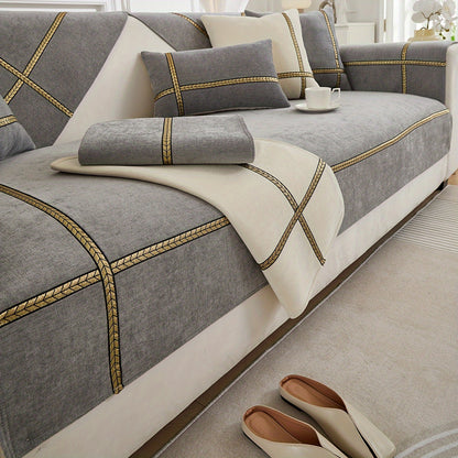 Elegant gray chenille sofa cover with golden braided trim. Non-slip, pet-friendly, and fits single to four-seater sofas. Perfect for all-season use as an elegant home decor in the living room.