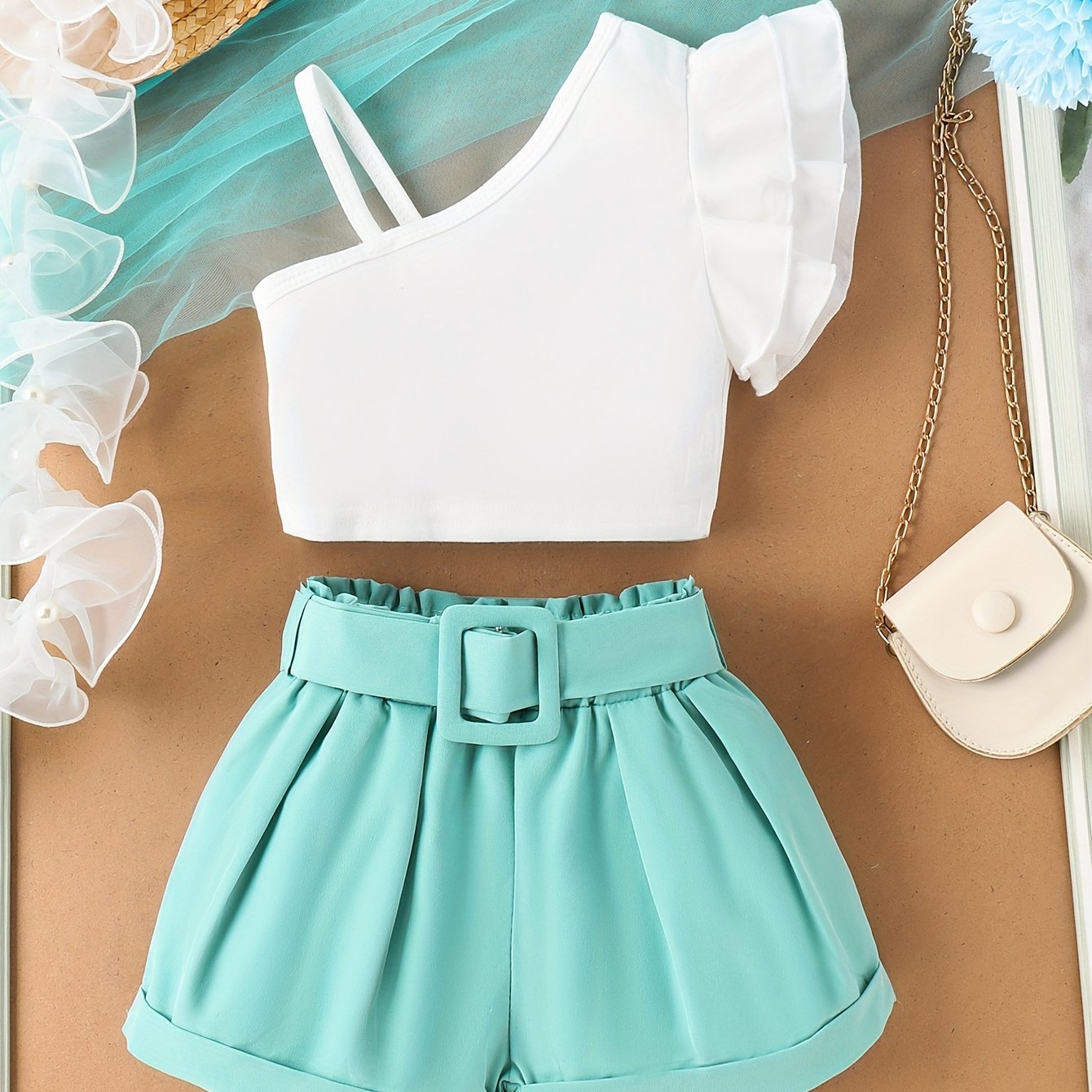 Girls' sleeveless top with flutter trim and elastic waist shorts set for summer party.