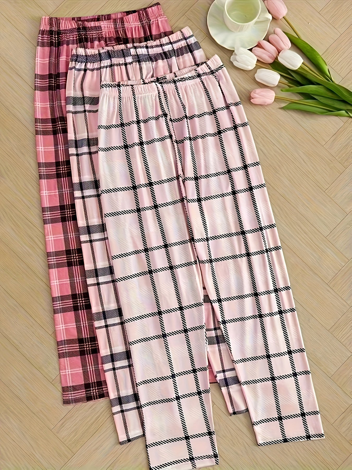 Women's plaid sleepwear pants set in pink and white checkered pattern for summer 2024. Includes elastic waistband for all-season comfort. Machine washable pajama set.