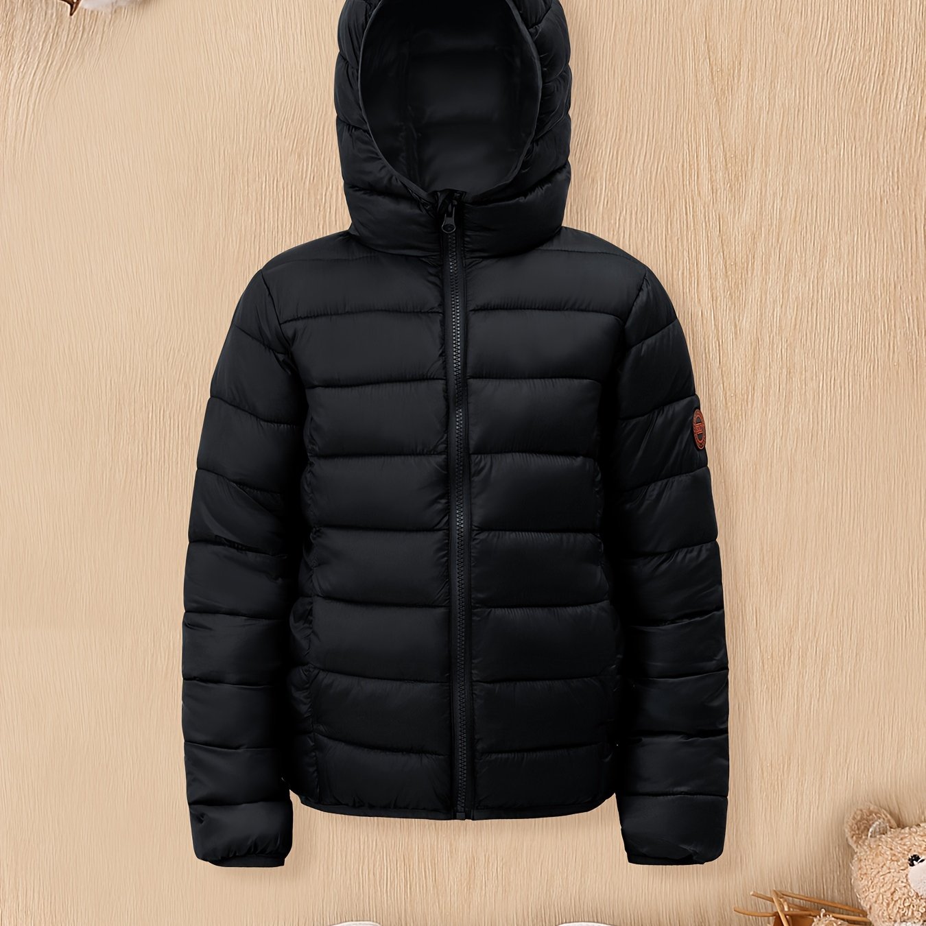 Boys' cozy hooded zip-up coat ideal for chilly weather.