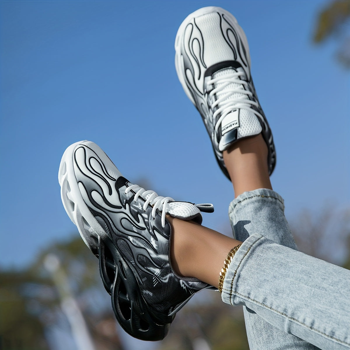 Versatile all-season lightweight running shoes in blue and pink ombre with breathable fabric and lace-up closure.