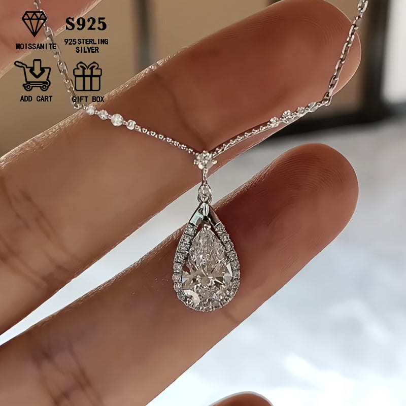 This elegant and dazzling necklace features a 3.6G hypoallergenic S925 silver chain adorned with a pear-shaped 2 carat Moissanite stone. The teardrop-shaped design is perfect for ladies, making it a stunning holiday gift. Presented in a luxurious