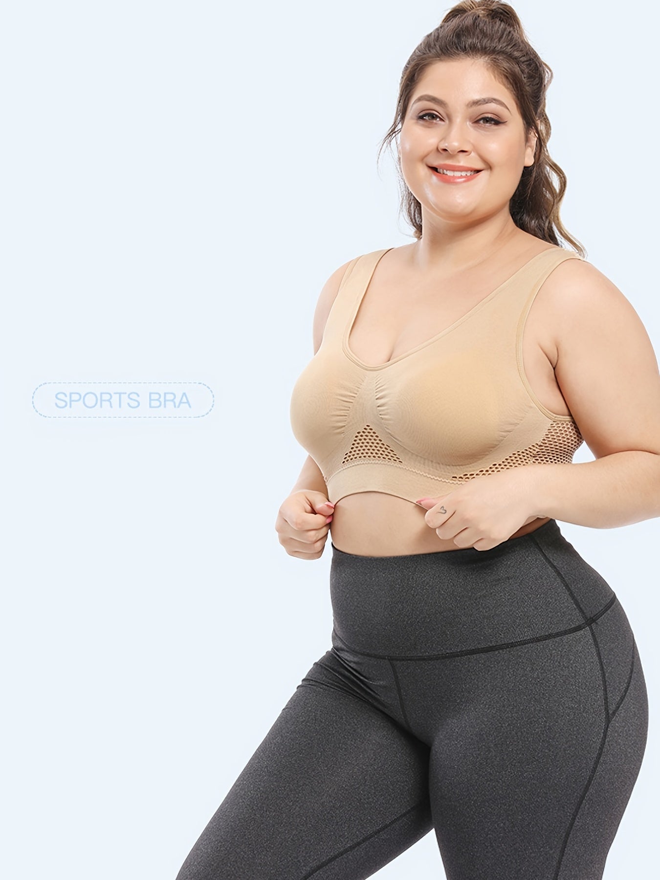 Seamless purple sports bra for plus size women, with breathable mesh fabric, push-up support, removable pads, and comfort fit. Available in sizes 36XL to 40XL.