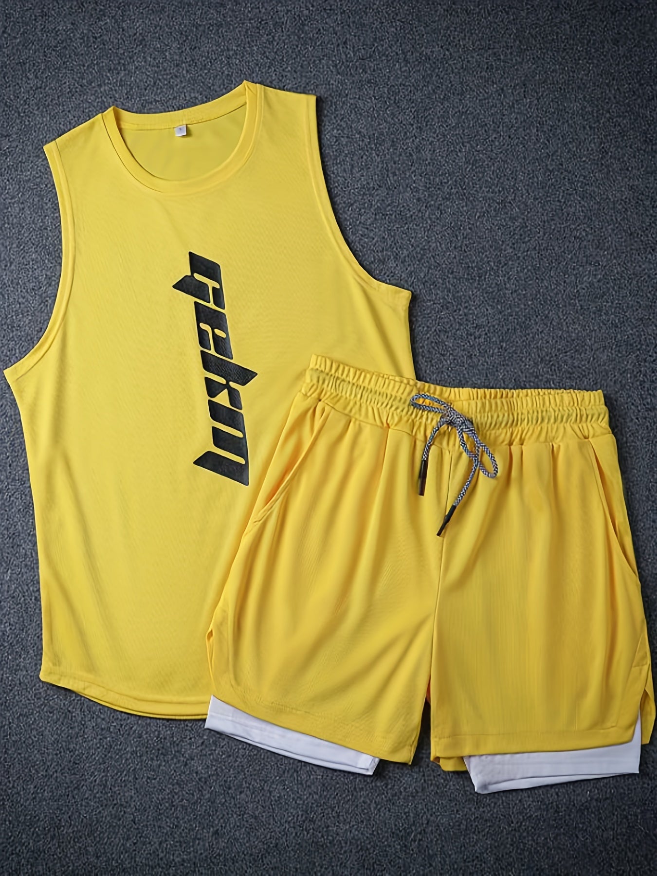 Men's 2-piece basketball outfits with letter print, casual graphic tank top and loose drawstring 2-in-1 shorts set.