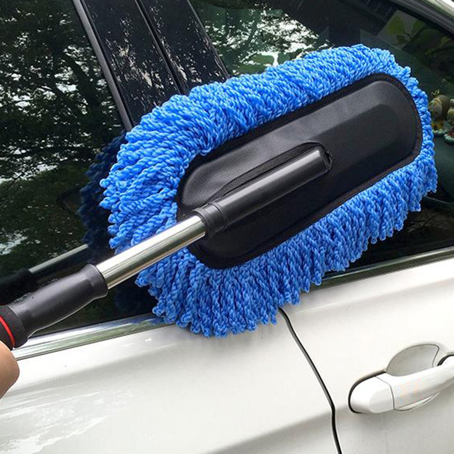 Extendable car wash mop with detachable microfiber pads for dusting and waxing, with stainless steel handle, ideal for reaching tight spaces.