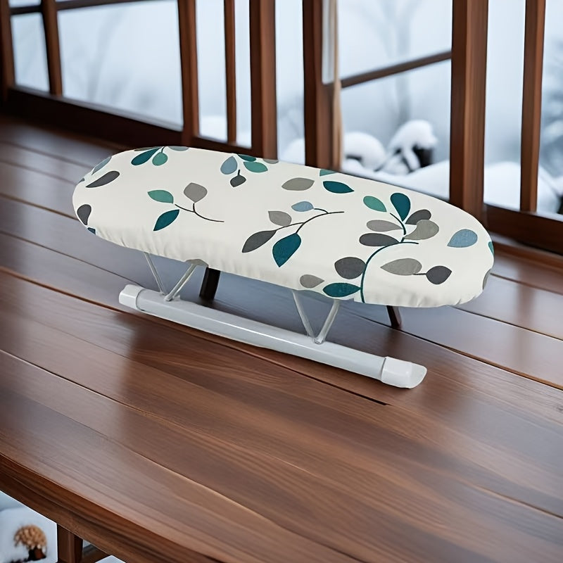 Portable mini ironing board featuring a leaf pattern, perfect for ironing sleeves and collars. Lightweight and easy to transport, no electricity or batteries needed.