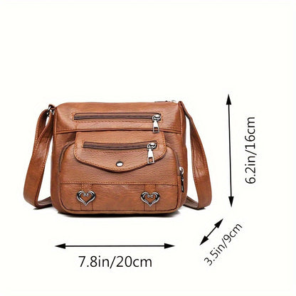 Square bag with multiple pockets and adjustable strap, suitable for travel. Zipper direction random.