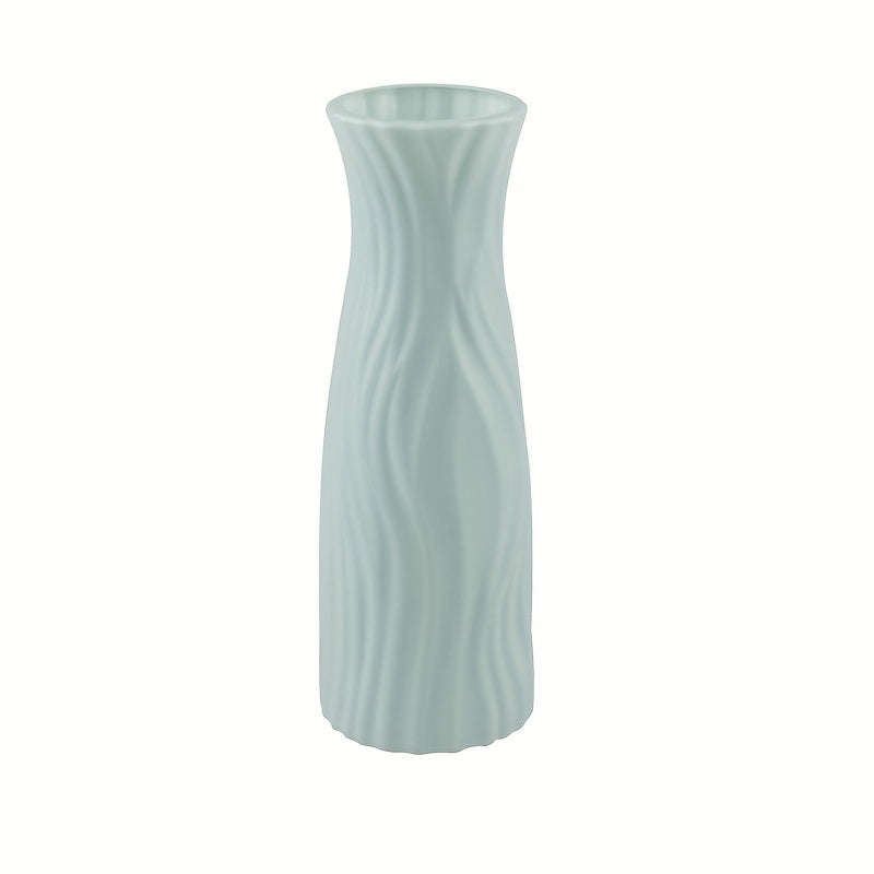 Plastic vase with ceramic look for home or office decor.