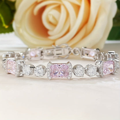 This stunning Sterling Silver Bracelet features dazzling Pink Cubic Zirconia stones. Ideal for everyday wear or as a thoughtful gift, especially for those born in October.