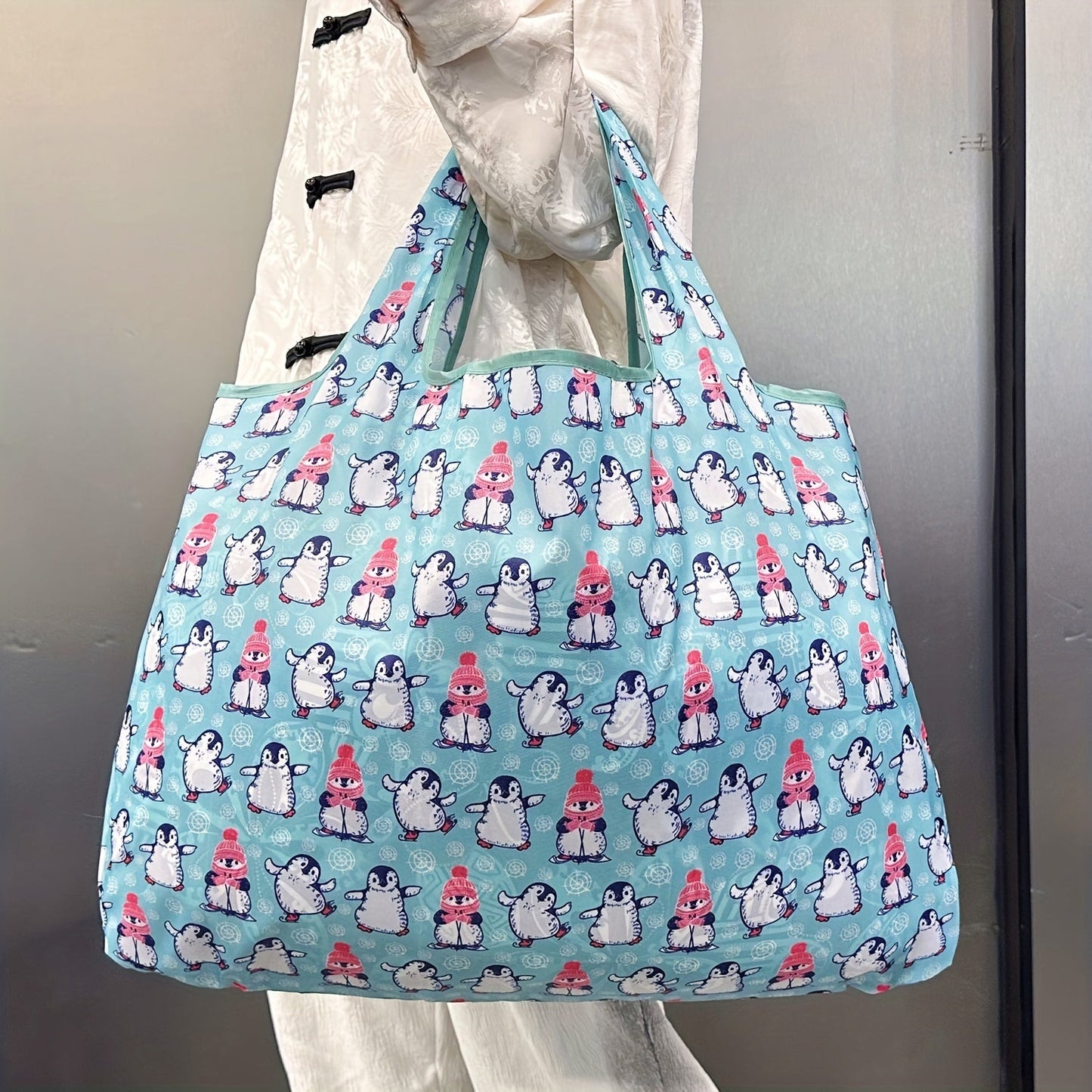 Durable and Lightweight Penguin Pattern Tote Bags - Perfect for Shopping, Groceries, and Everything in Between! These reusable and foldable totes are also recyclable, water resistant, and compact enough to fit in your pocket.