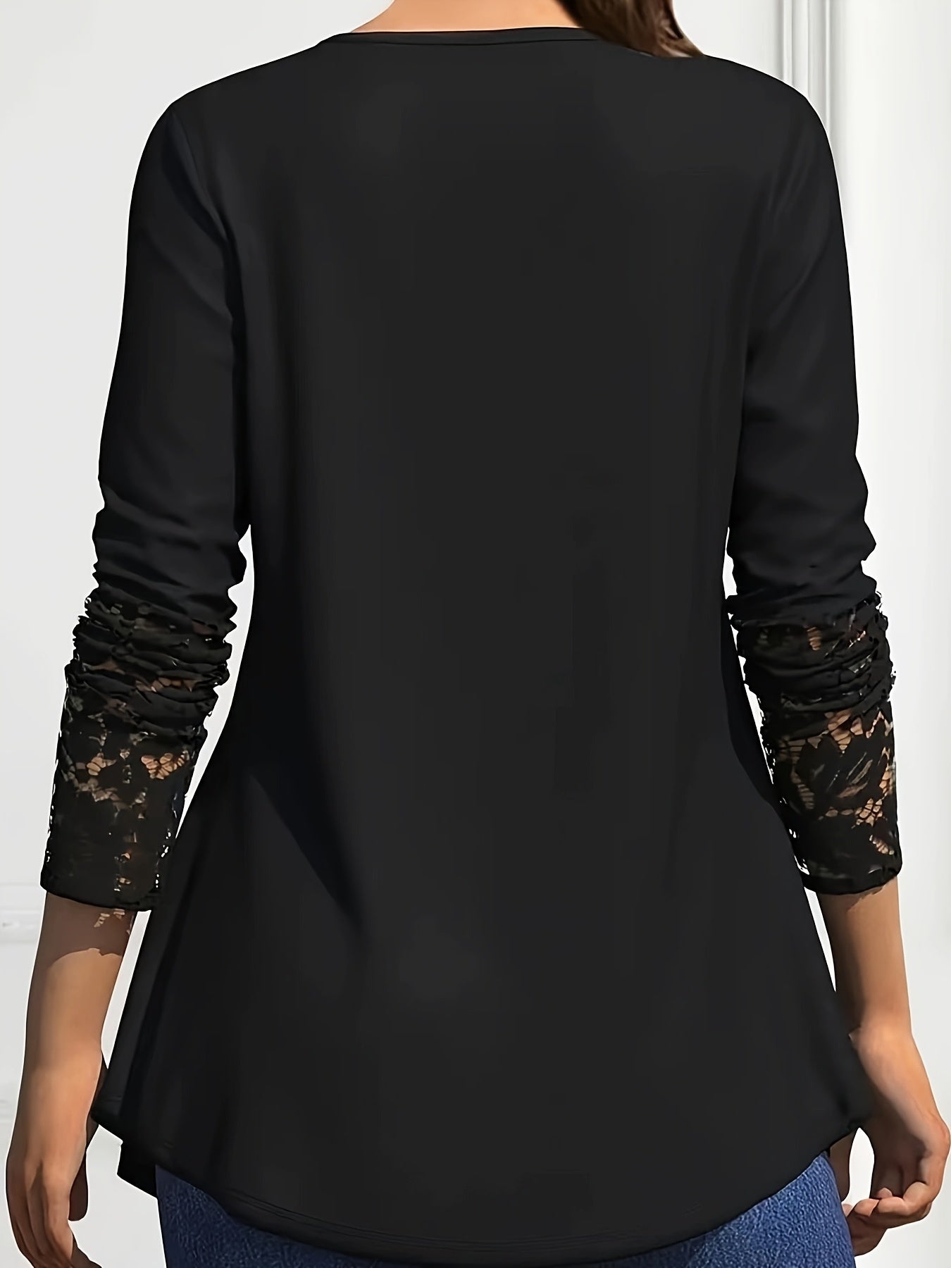 Stylish lace-trim V-neck tunic for plus sizes, with long sleeves, stretchy semi-sheer fabric, color block design, and loose fit.