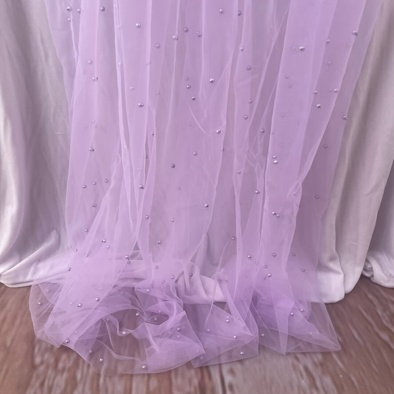 Enhance the ambiance of your special events with our Romantic Pearl Lace Table Runner. Perfect for weddings, bridal showers, and more, this elegant decoration is crafted from embroidered sheer chiffon tulle that is wrinkle-free for a luxurious look.