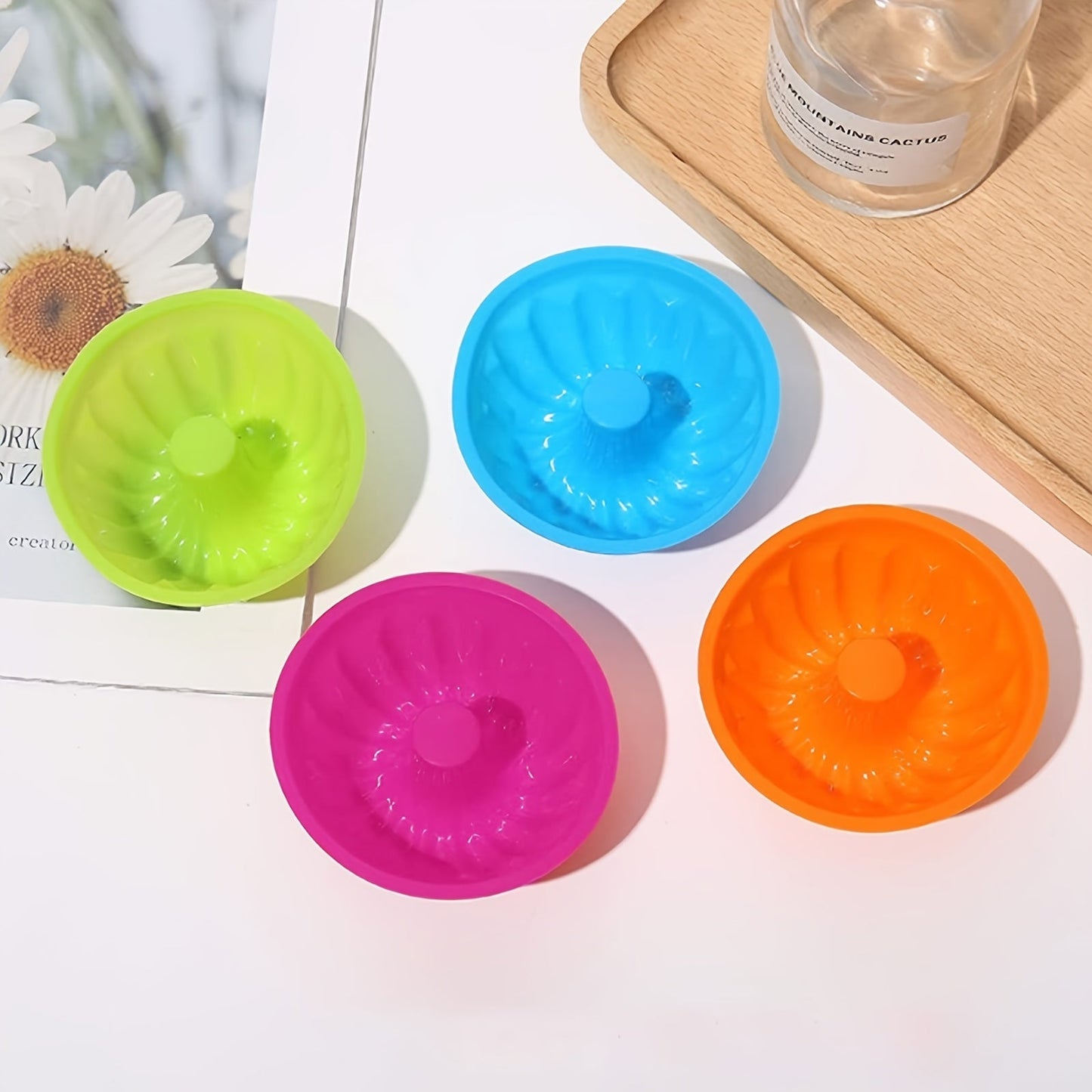 Get a dozen Mini Silicone Baking Cake Molds now! These nonstick cupcake liners are BPA-free and perfect for creating fancy desserts like jelly and muffins. Ideal for your baking needs.