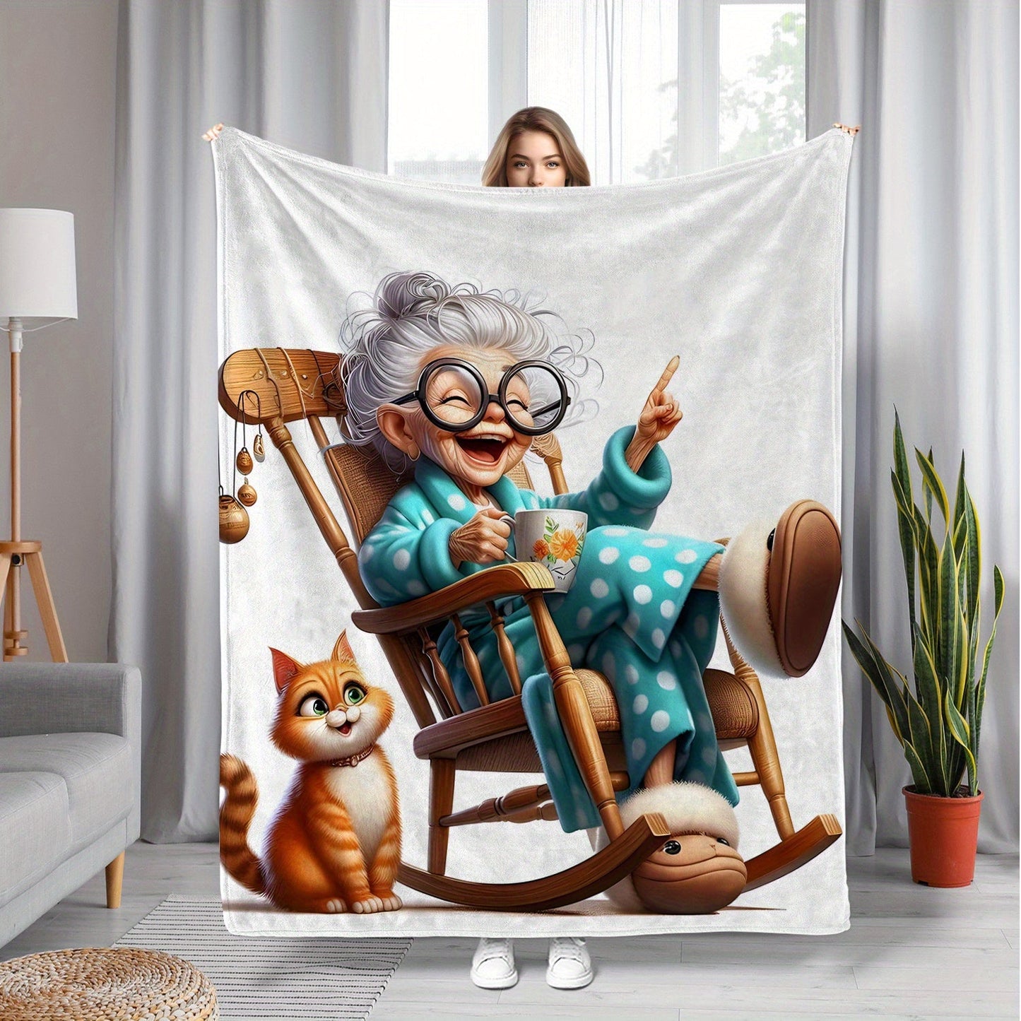 Stay warm and cozy with the 1pc Cozy Senior Life Flannel Throw Blanket featuring a charming Grandma in Rocking Chair with Cat print design. This contemporary style blanket offers all-season comfort with its knitted polyester material. It's the ideal gift