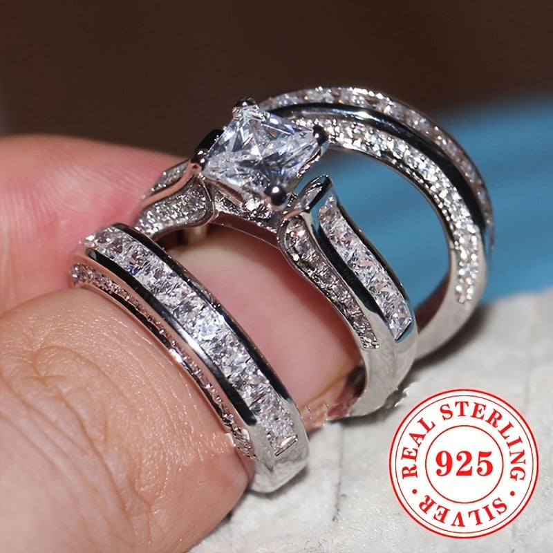 Gorgeous 3-piece Bridal Engagement Ring Ensemble Made of 925 Sterling Silver and Synthetic Cubic Zirconia. Features a Timeless 4-Prong Princess Cut Design, Perfect for April Birthdays. Ideal for Weddings, Proposals, Everyday Wear, and Suitable for All