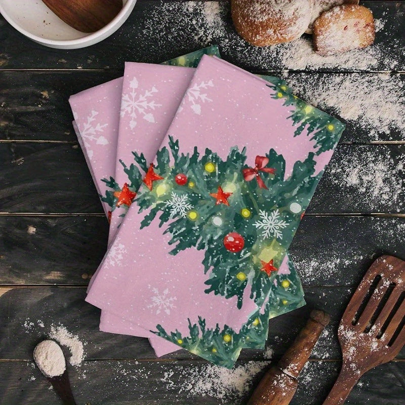 Set of 2 Merry Christmas kitchen towels, measuring 18 by 66.04 cm each. Featuring a pink design with a sparkle Christmas tree ornament. Includes a kitchen towel and dish towel.