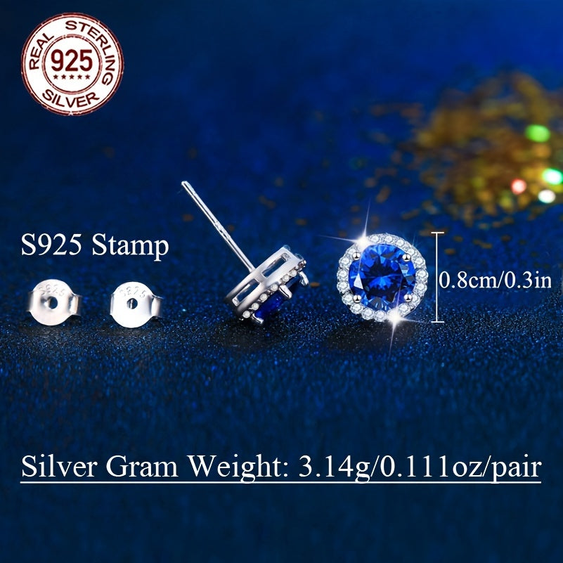 A beautiful pair of royal blue Tanzanite stud earrings in an elegant vintage style. Made from 925 sterling silver and featuring synthetic stones, these earrings are hypoallergenic and perfect for special occasions like weddings, gifting, Valentine's Day