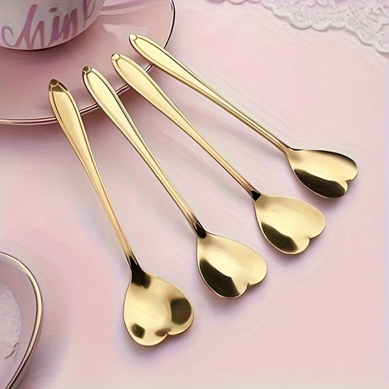 Celebrate love with 2 stainless steel coffee spoons shaped like hearts, the perfect gift for Valentine's Day. These creative spoons are perfect for stirring desserts and are ideal for Christmas parties, holidays, restaurants, and home use.