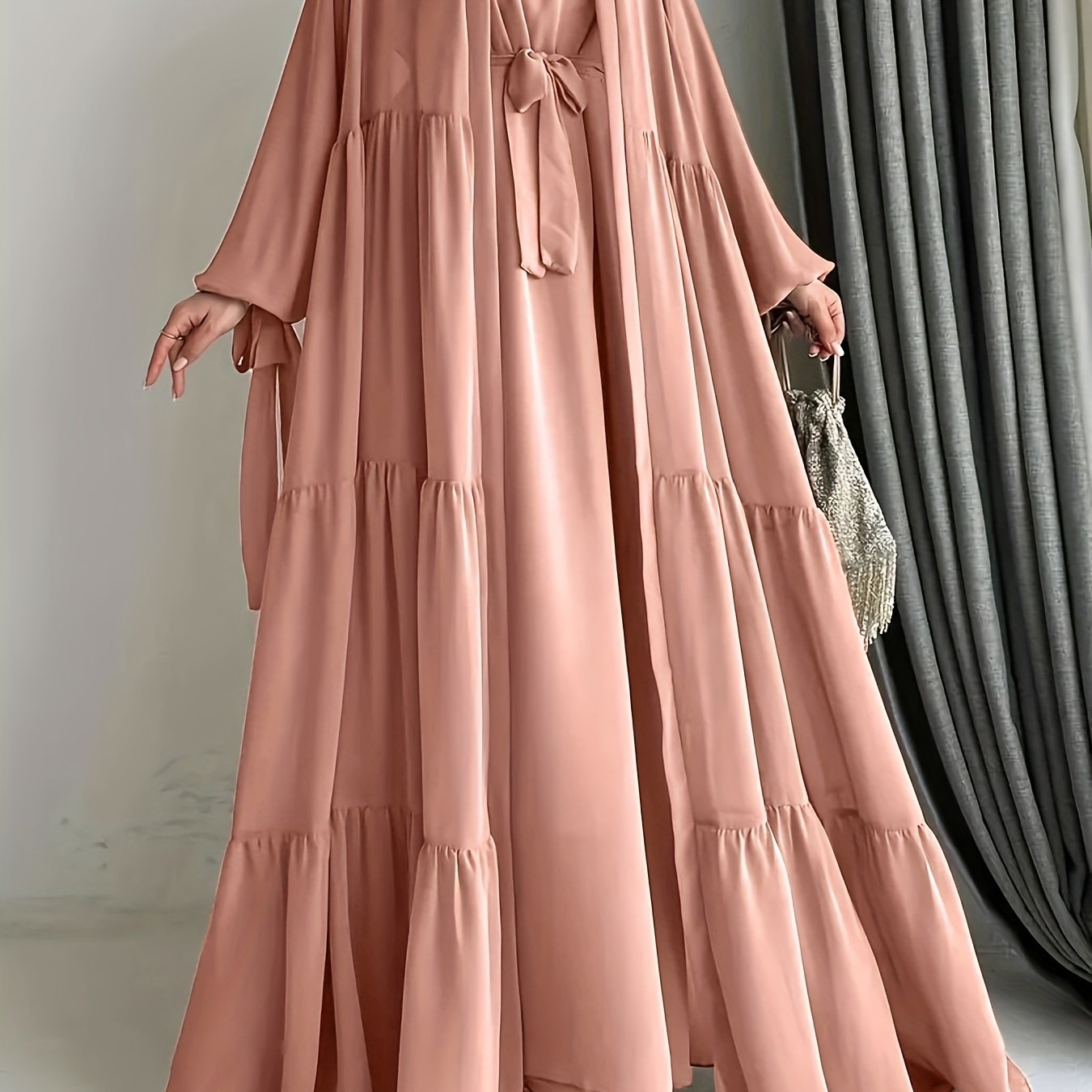 A stylish Middle Eastern Abaya set with vest and belt, featuring a chiffon H-Line robe with side split, lantern sleeves, and ruffle hem detail - perfect for all seasons.