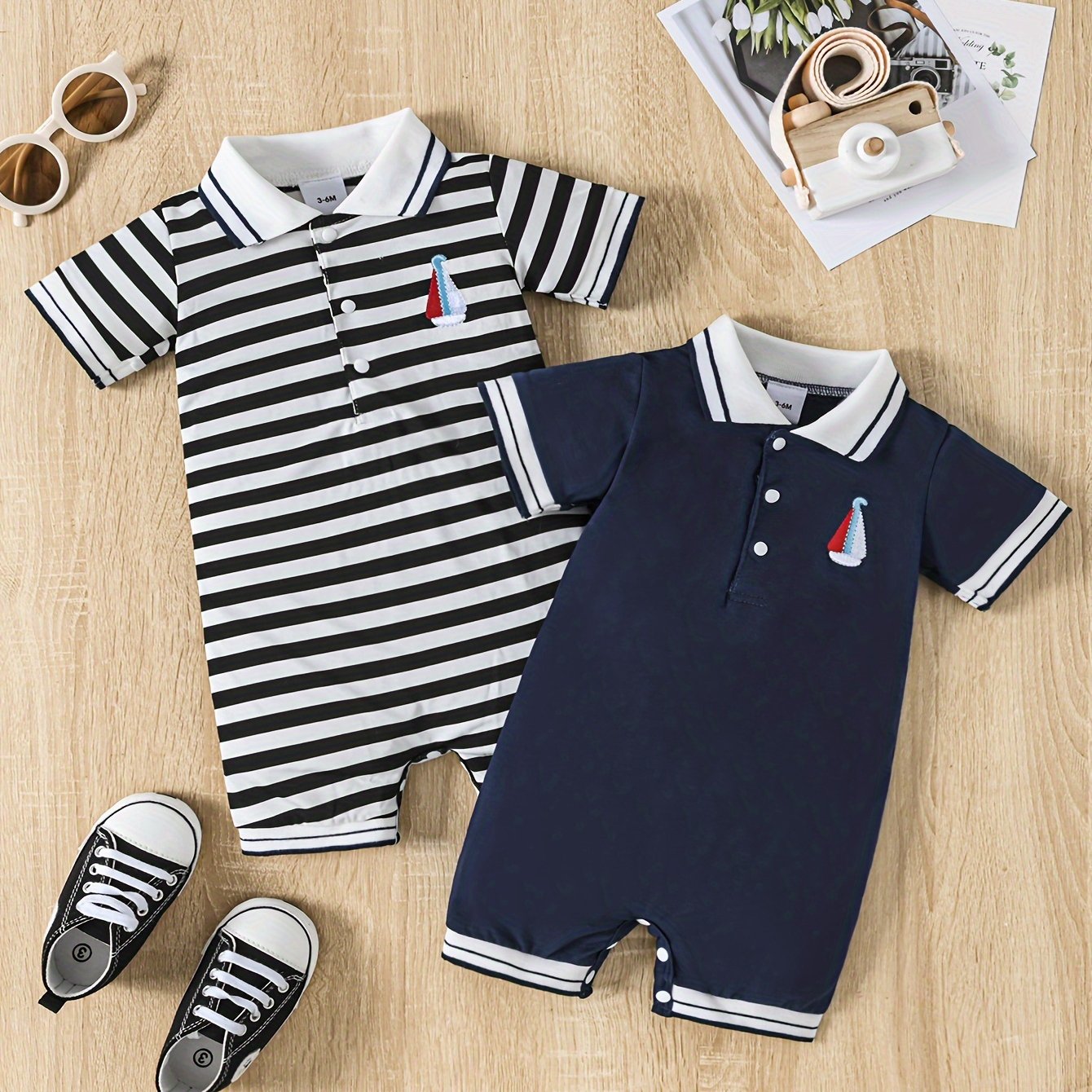 Summer one-piece and two-piece casual crawler suit for infant and toddler boys and girls with short sleeves and half-open chest.