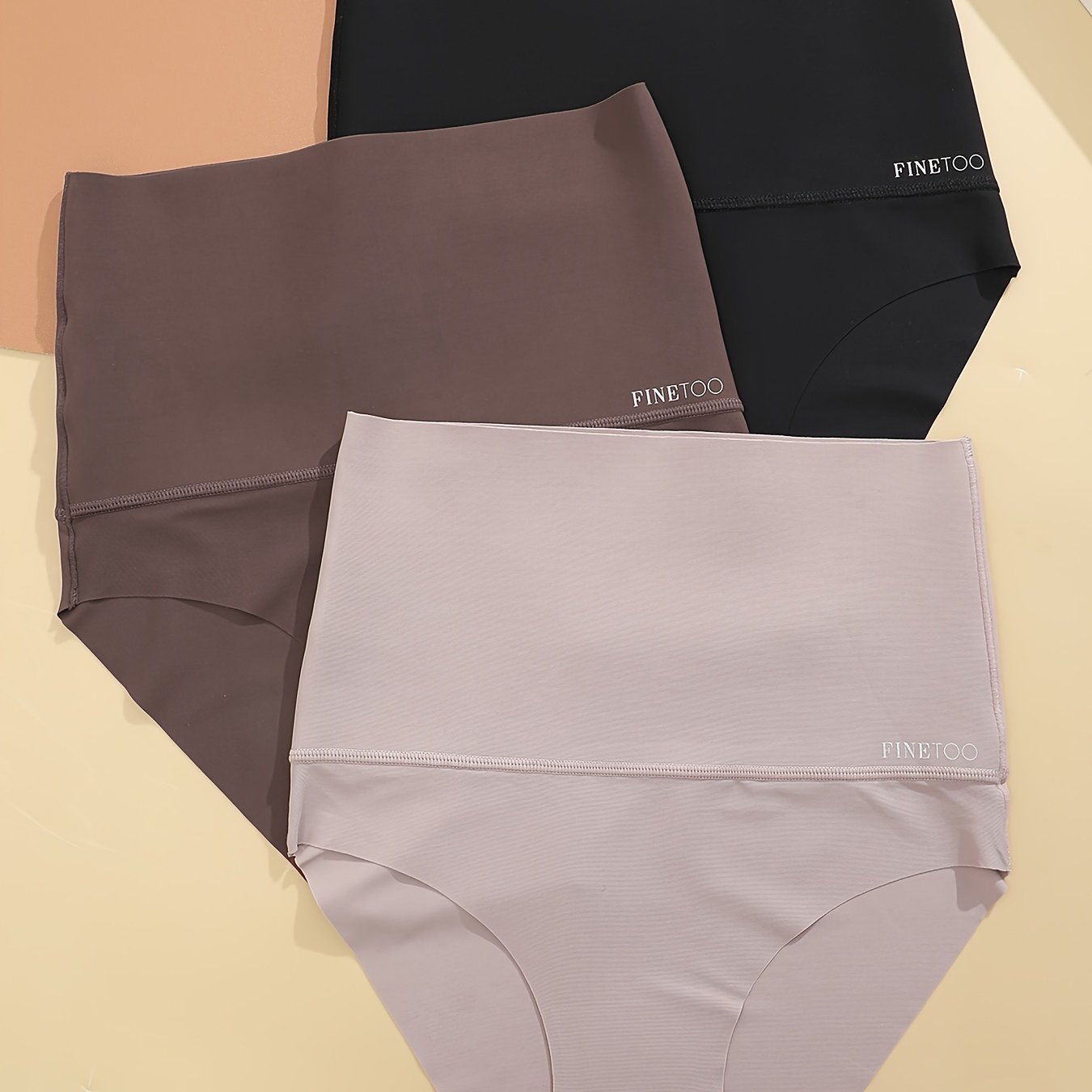 Three seamless solid briefs with high waist design, made of breathable and stretchy material, perfect for women's lingerie and underwear.