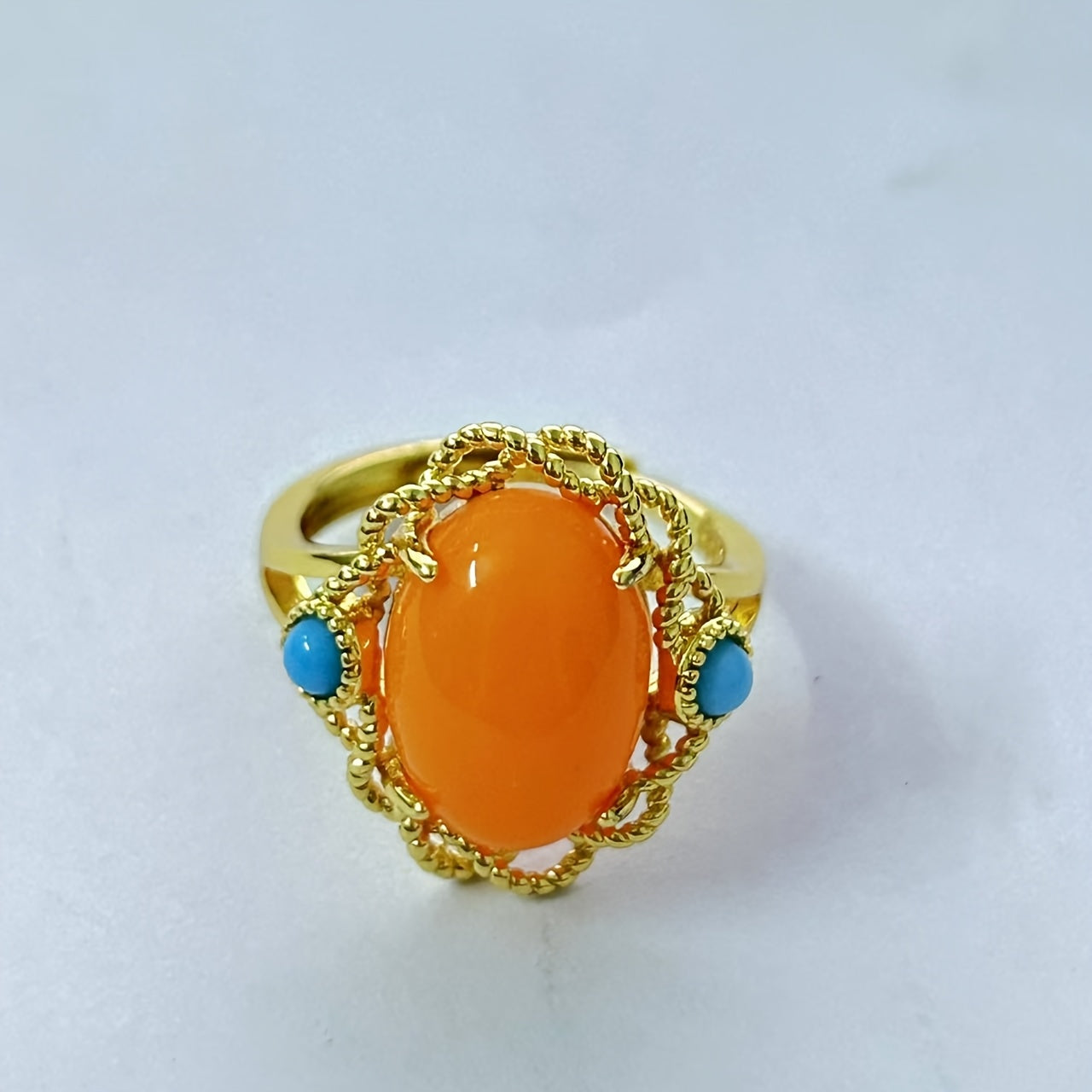 Vintage vacation style Claddagh ring featuring synthetic amber and turquoise stones, crafted with 18K golden plated 925 silver. The ring has an adjustable opening and is perfect for both daily wear and special occasions. This handcrafted personalized