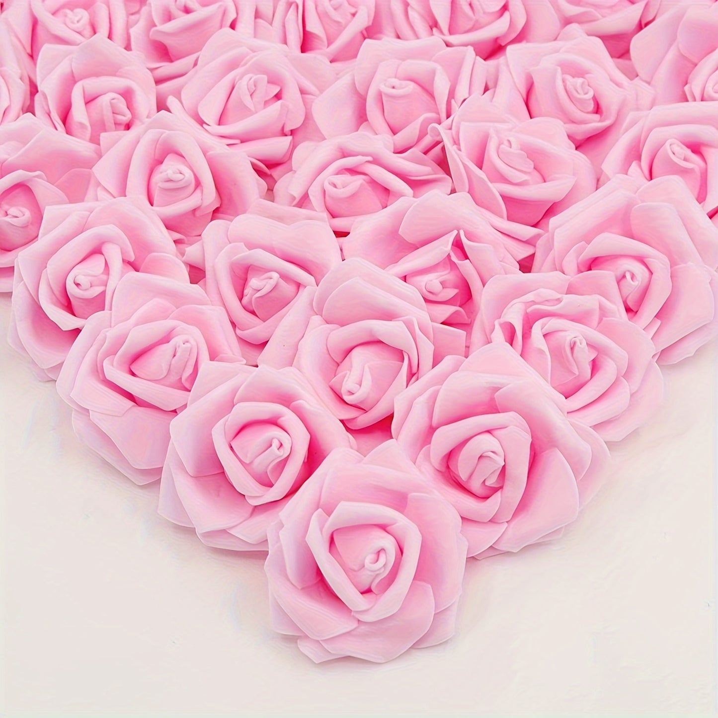 50 pack of luxurious PE foam artificial rose flower heads for various occasions - perfect for DIY crafts, weddings, and home décor throughout the year.