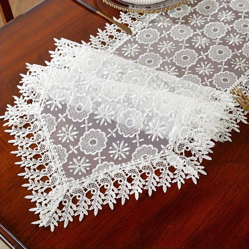 Polyester table runner with white embroidery flowers and lace edge, perfect for room or dining table decor.