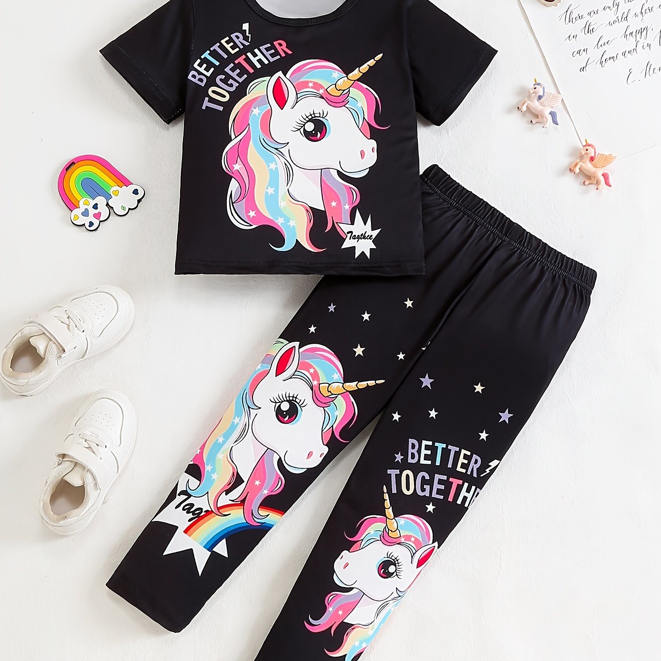 Girls' magical creature graphic t-shirt and jogger pants set. Casual outfit with animal print, regular fit, and medium stretch. Perfect for ages 3+ for outdoor activities.