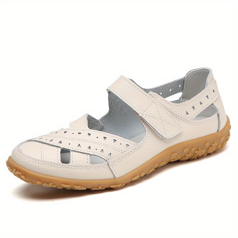 Flat heel round toe strappy back synthetic beach shoes for women, featuring hook-and-loop fastener.