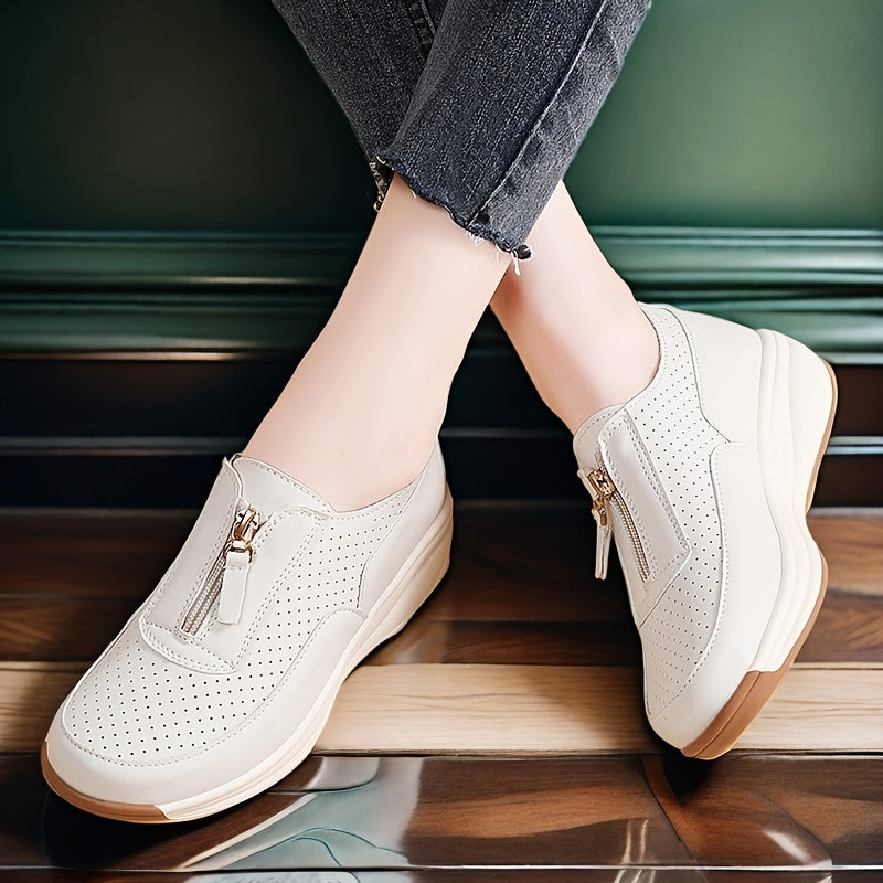 Beige perforated women's casual sneakers with zipper detail, thick sole, and anti-slip features.