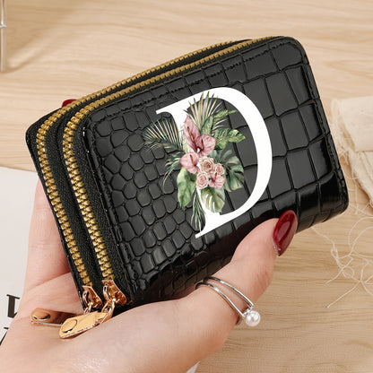 Women's credit card wallet with elegant floral letter print in black & white. Features large capacity, dual zipper, crocodile texture PU, lightweight design with nylon lining for everyday