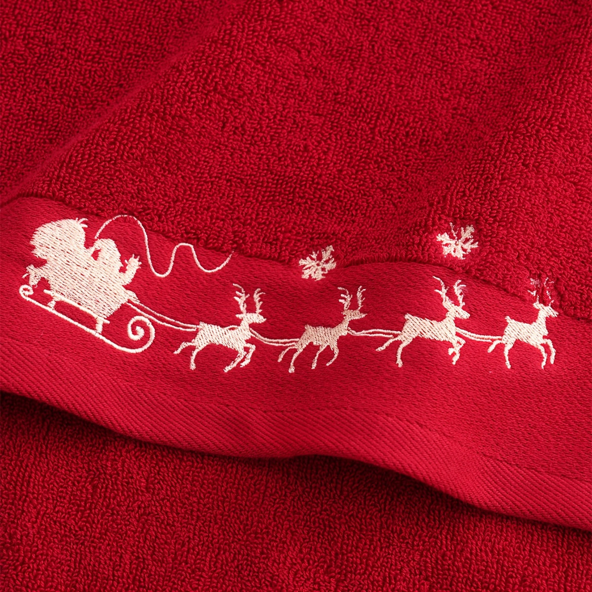 2 QIBHI Vintage Christmas Reindeer embroidered hand towels made from 100% cotton knit fabric. Cartoon-themed oblong bathroom towels perfect for festive holiday gifts. Hand wash only, 450gsm. Adds a playful holiday motif and soft festive texture to your