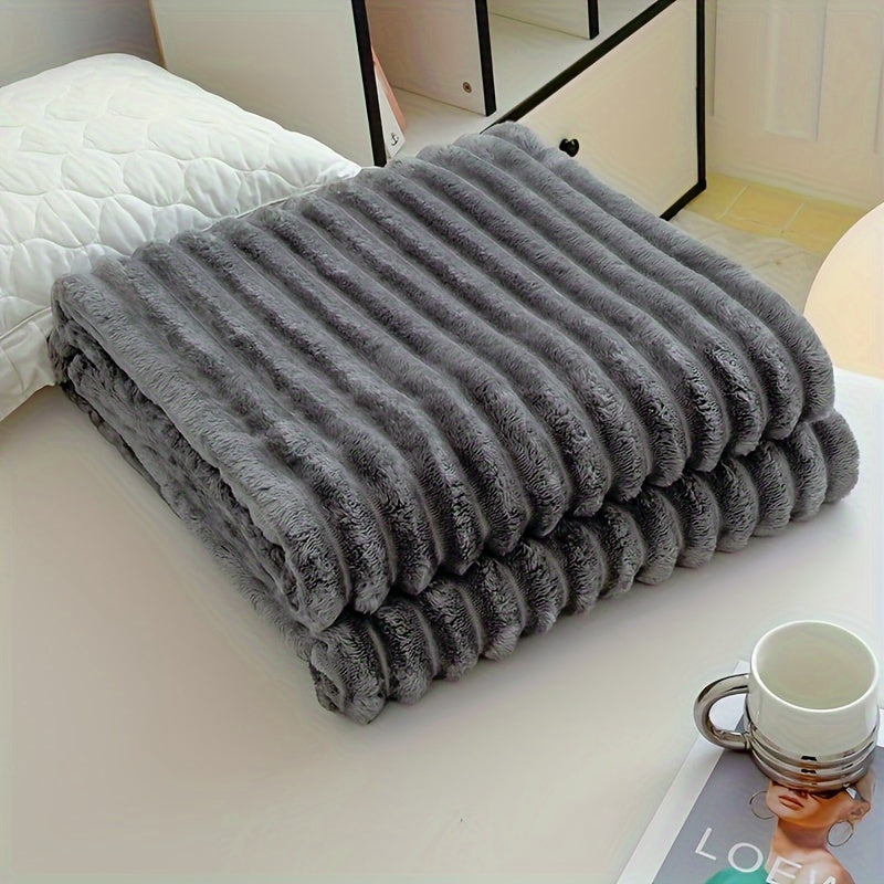 Machine washable, this luxurious double-sided throw blanket is made of faux rabbit fur that is warm, soft, and cozy. Perfect for naps, office use, outdoor camping, or on the sofa. The soft striped design adds a touch of elegance, making it a perfect gift