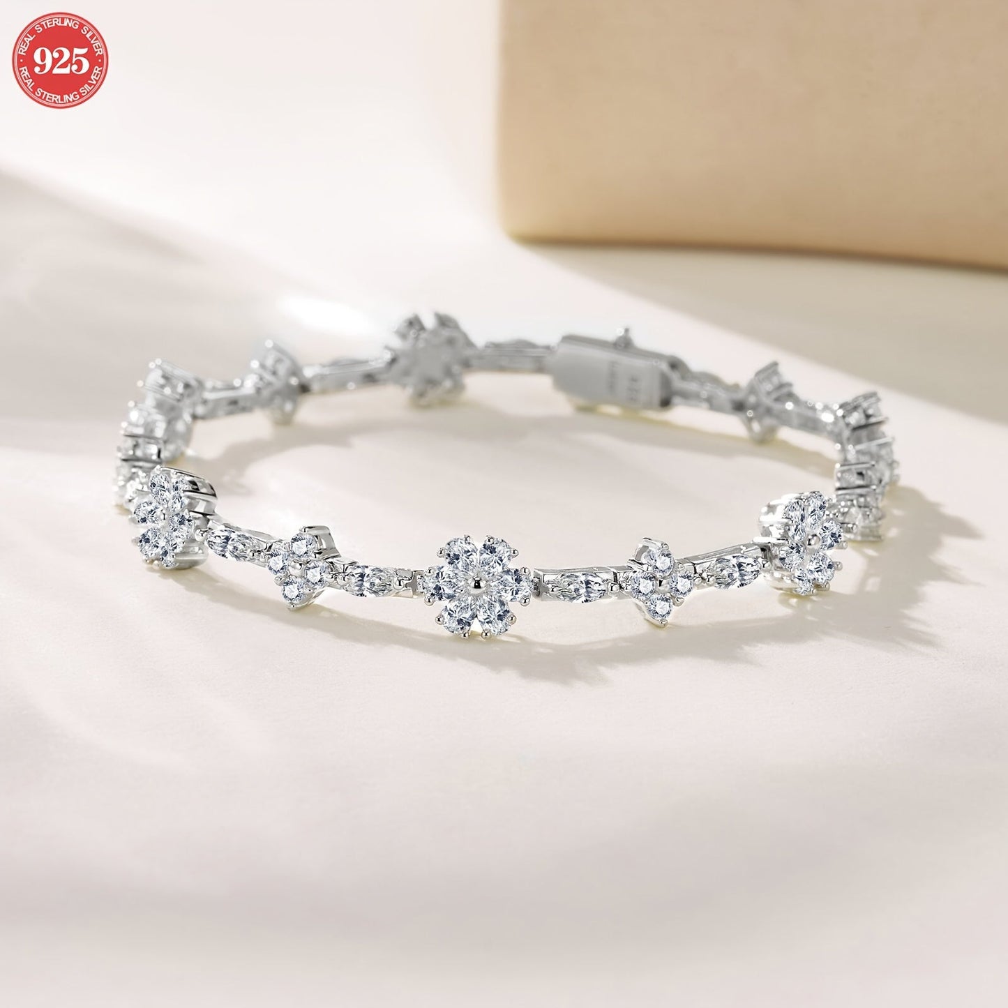 One elegant Onedia bracelet crafted from 925 sterling silver with sparkling synthetic moissanite stones. This stunning piece is adorned with a white golden plating and features the October birthstone. Perfect for gifting, parties, and special occasions