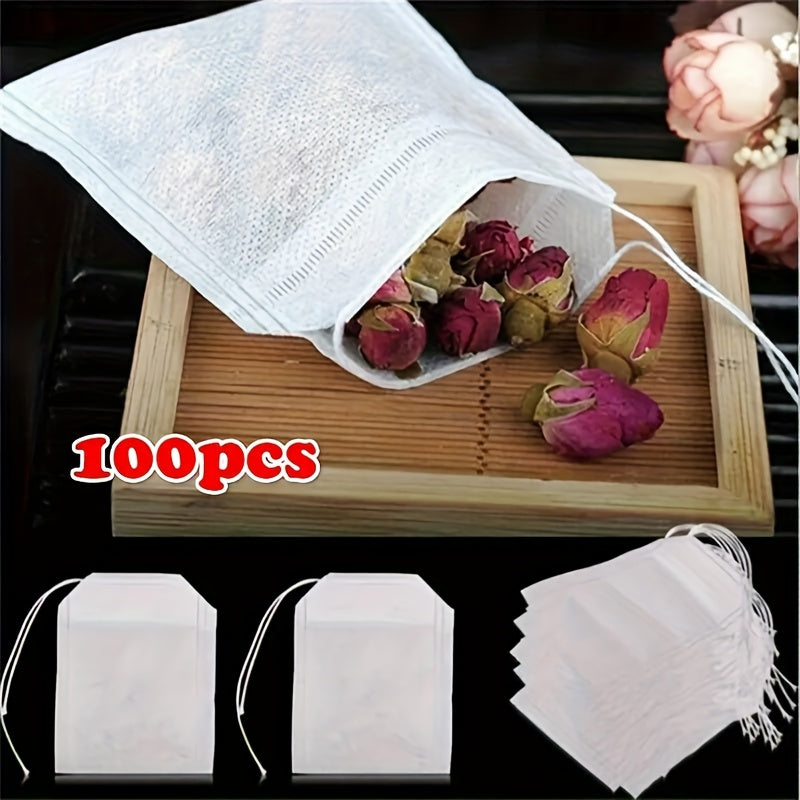 Pack of 100 Premium Disposable Tea Bags - Clear Non-Woven Fabric with Drawstring Closure, Great for Convenient Brewing - Suitable for Home & Business Use, Comes with Extra Scented Tea Leaves