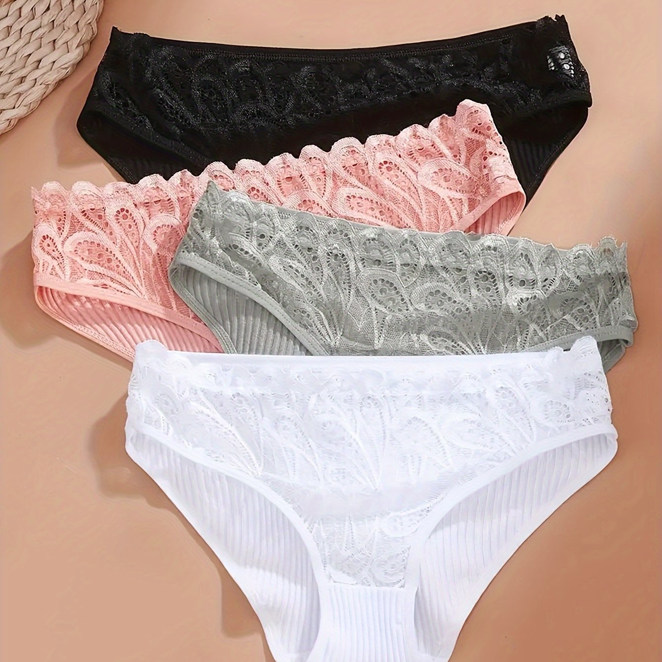 4-pack of lace trim briefs for women, made of comfortable breathable cotton.