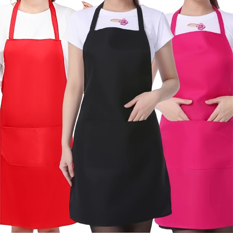 Waterproof adjustable polyester apron with pockets in red, black, and pink. Ideal for cooking, BBQ, and salon use. Great for BBQ essential gear.