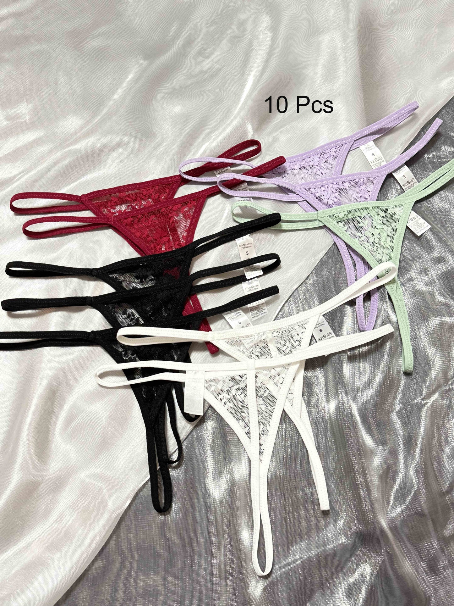 10-pack of sexy lace thong panties for women, low-rise polyamide fabric, transparent triangle design, adult theme, solid color with lace detailing