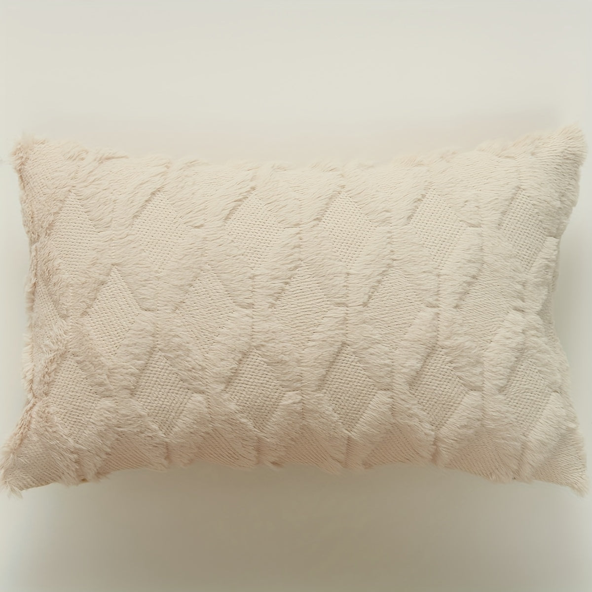 Indulge in the luxurious comfort of our Ultra-Soft Plush Diamond Quilted Throw Pillow Cover. Featuring a solid color back and a zip closure for easy removal, this cozy and comfortable cover is the perfect addition to your living room, bedroom, or sofa