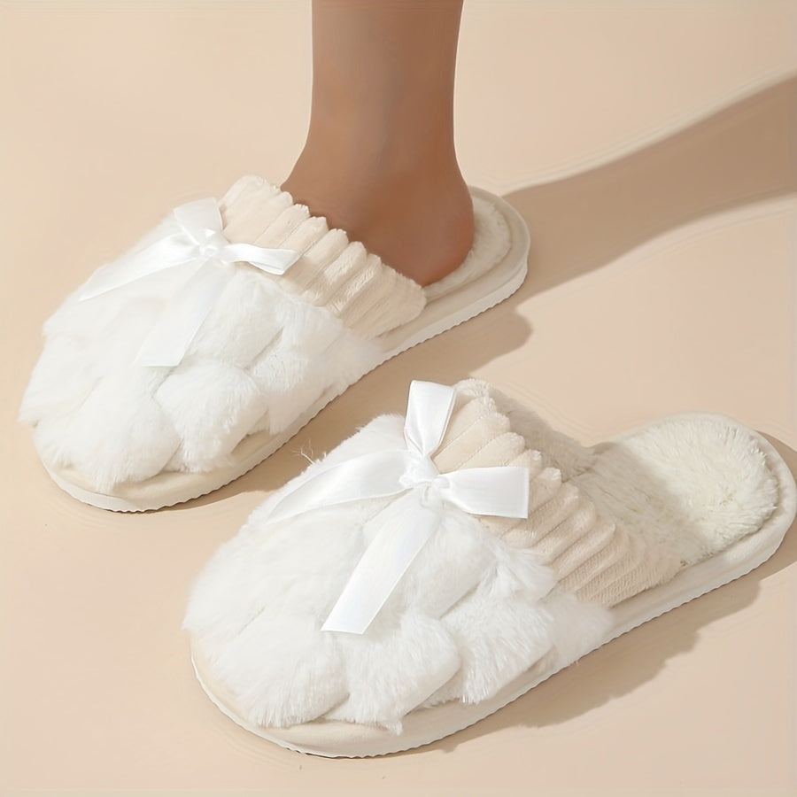 Winter plush cozy non-slip shoes with soft sole and flat bowknot decoration, ideal for home warmth.