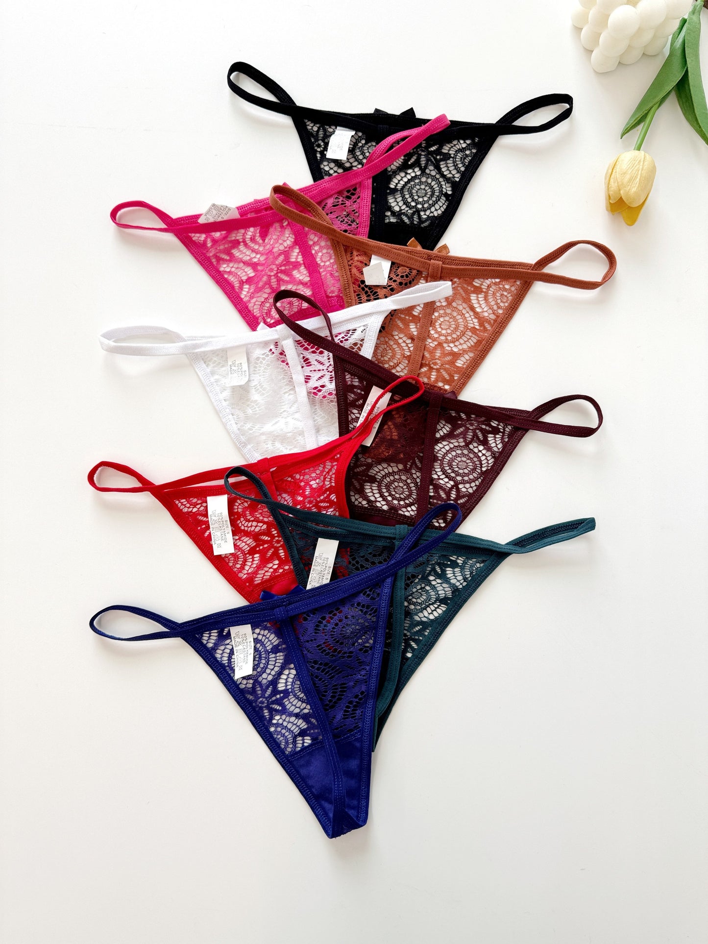 New thin strap low waist thong with lace, bowknot, and see-through design for a comfortable and breathable fit.