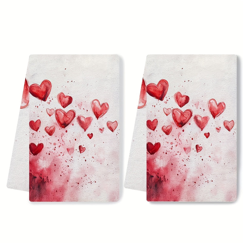 Set of 2 Valentine's Day Kitchen Towels, featuring 'Love At First Swipe' Hearts design. These Ultra Soft and Highly Absorbent Dish Hand Towels are perfect for holiday decor. Machine washable, each towel measures 16x24 inches. Item number: 2KYSYS1217559