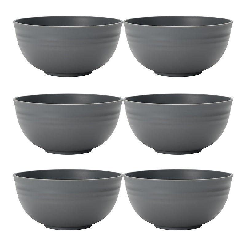 Durable plastic bowls safe for microwave use, perfect for meals at home or on-the-go. Offered in sets of 2, 4, or 6.