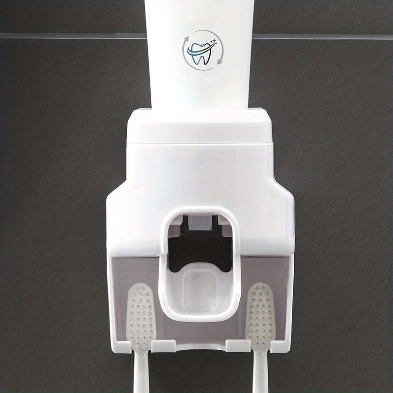 Wall mounted toothbrush holder and toothpaste dispenser with automatic squeezer, ideal for family washroom.