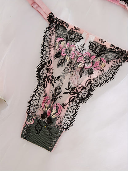 Sexy lingerie set with floral embroidery mesh and sheer fabric, including bra and thong underwear.