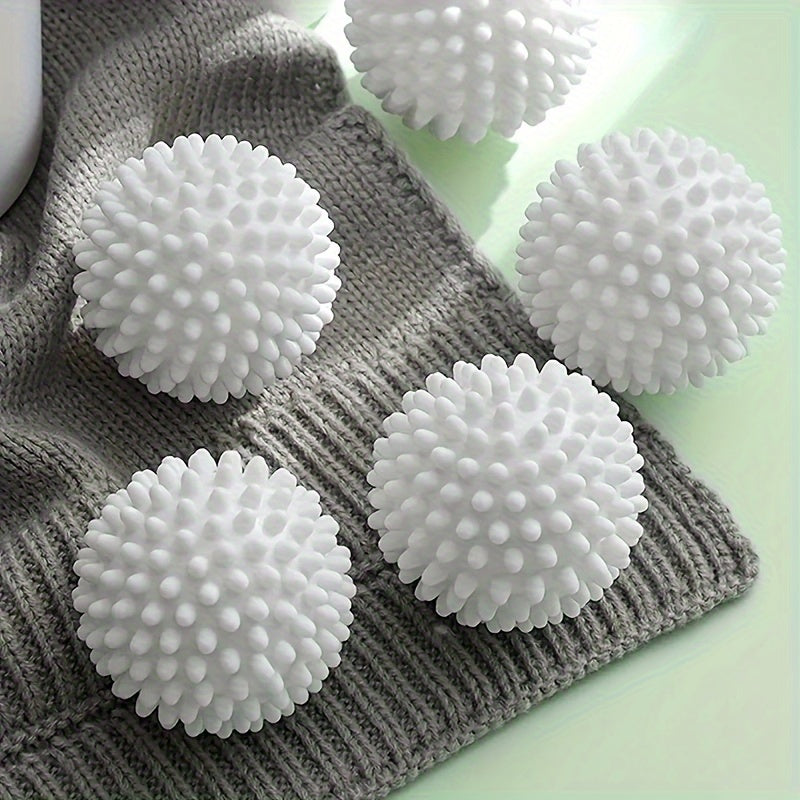 4 reusable laundry balls with multiple functions—lint remover, fabric softener, anti-roll, wrinkle reducer; no electricity needed.