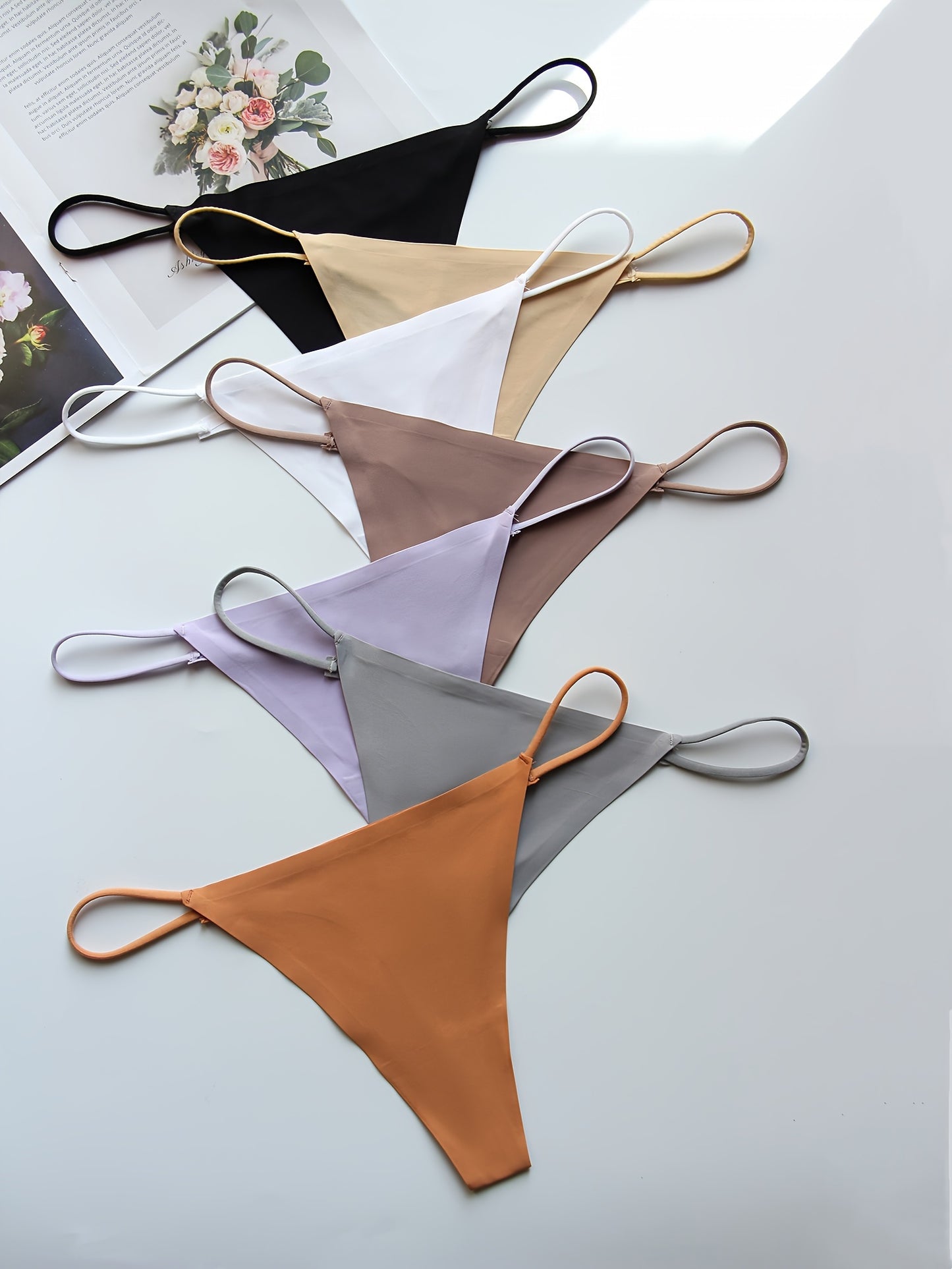 7 pairs of low-waisted thong belts in plain colors, soft and sexy lady's underwear